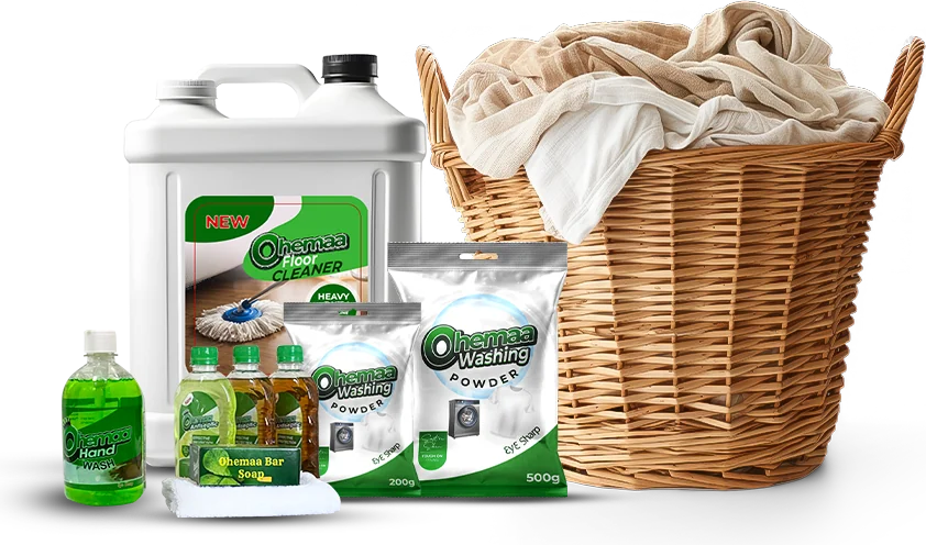 The Ohemaa range: floor cleaner, washing powder, hand wash and bar soap beside a laundry basket